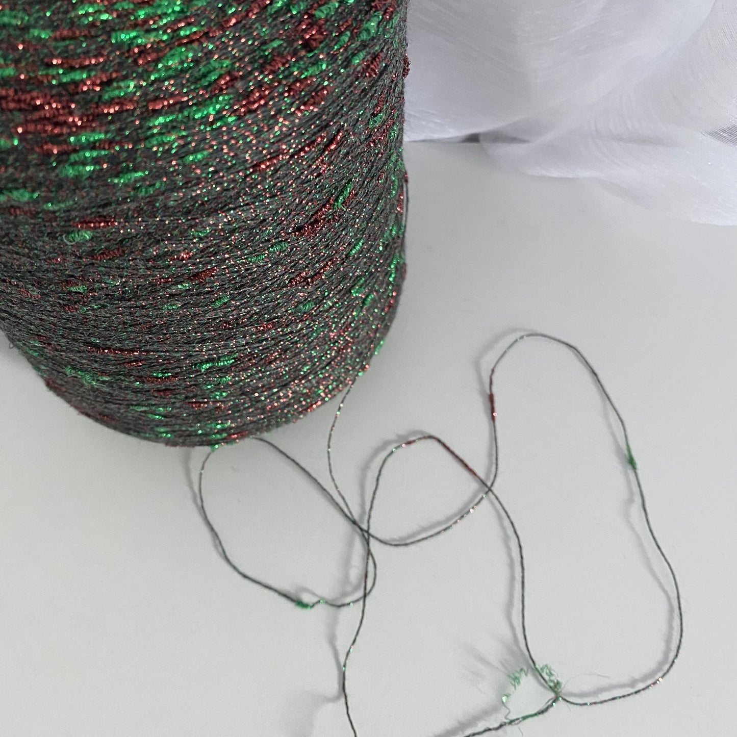 Konenwolle Merinowolle mit Lurex.