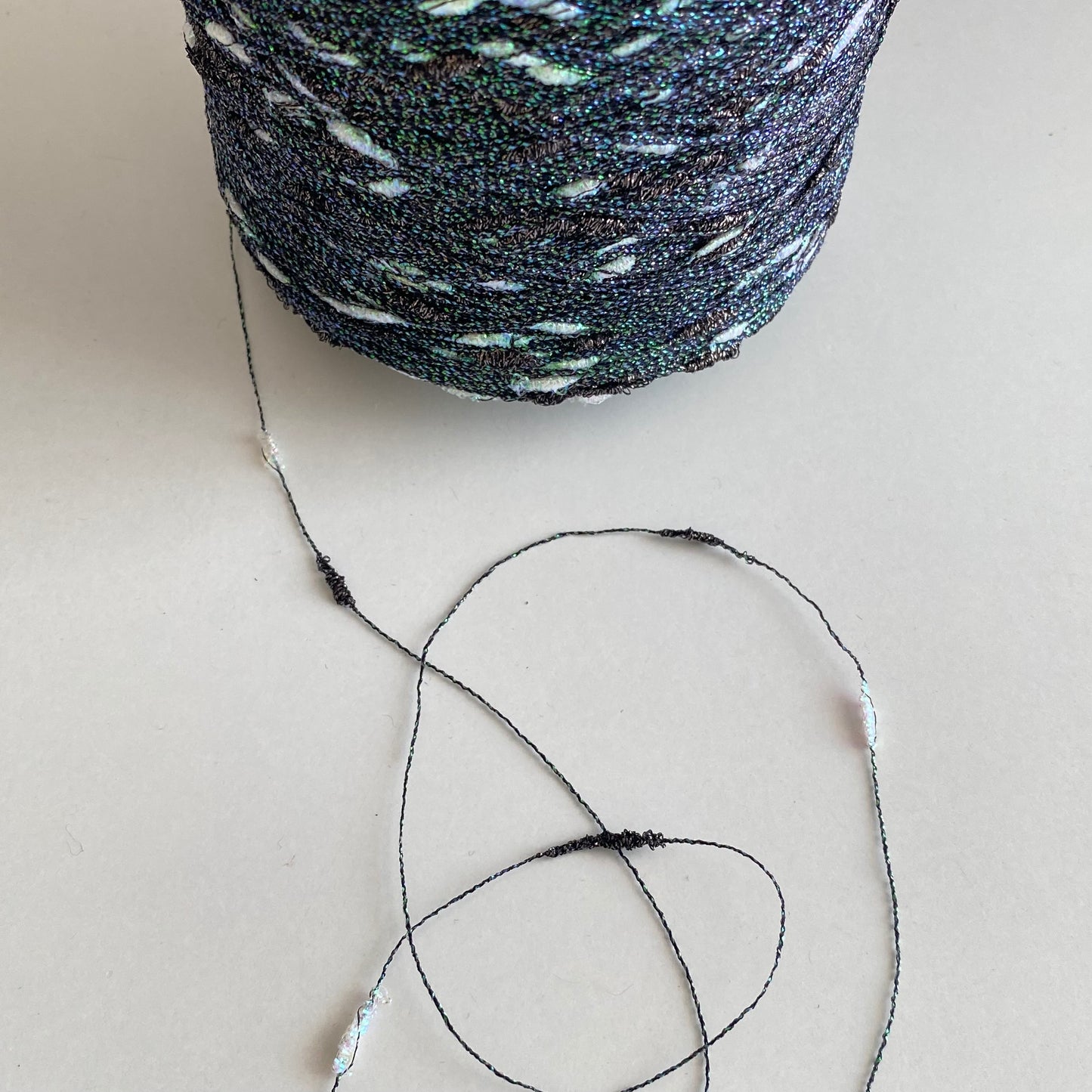 Konenwolle Merinowolle mit Lurex.