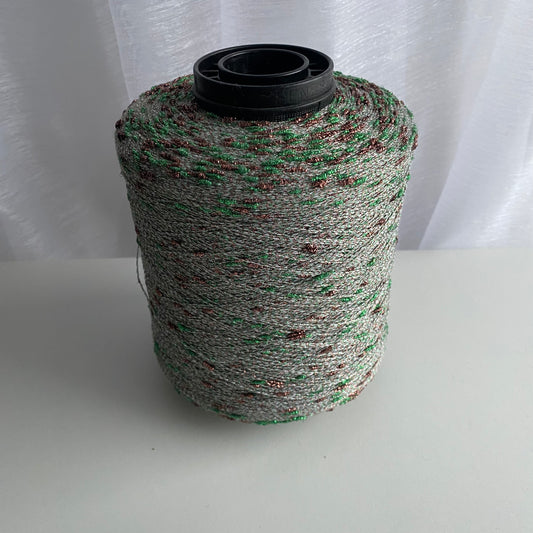 Konenwolle Merinowolle mit  Lurex.