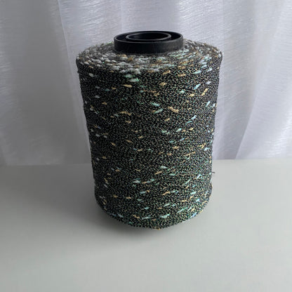 Konenwolle Merinowolle mit  Lurex.