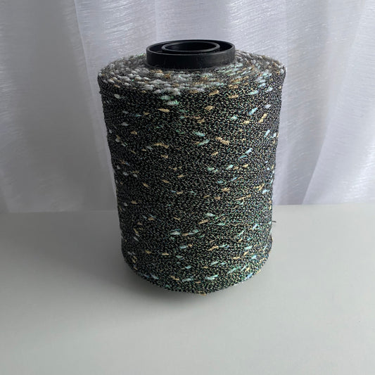 Konenwolle Merinowolle mit  Lurex.