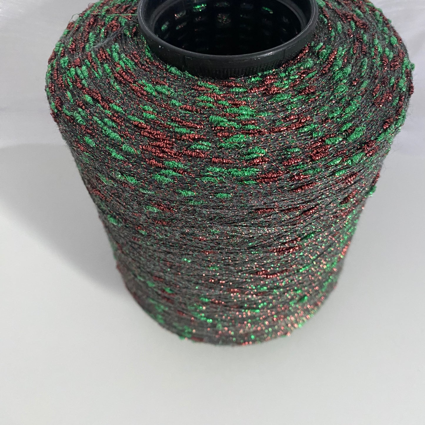 Konenwolle Merinowolle mit  Lurex.