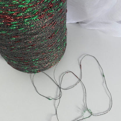 Konenwolle Merinowolle mit  Lurex.
