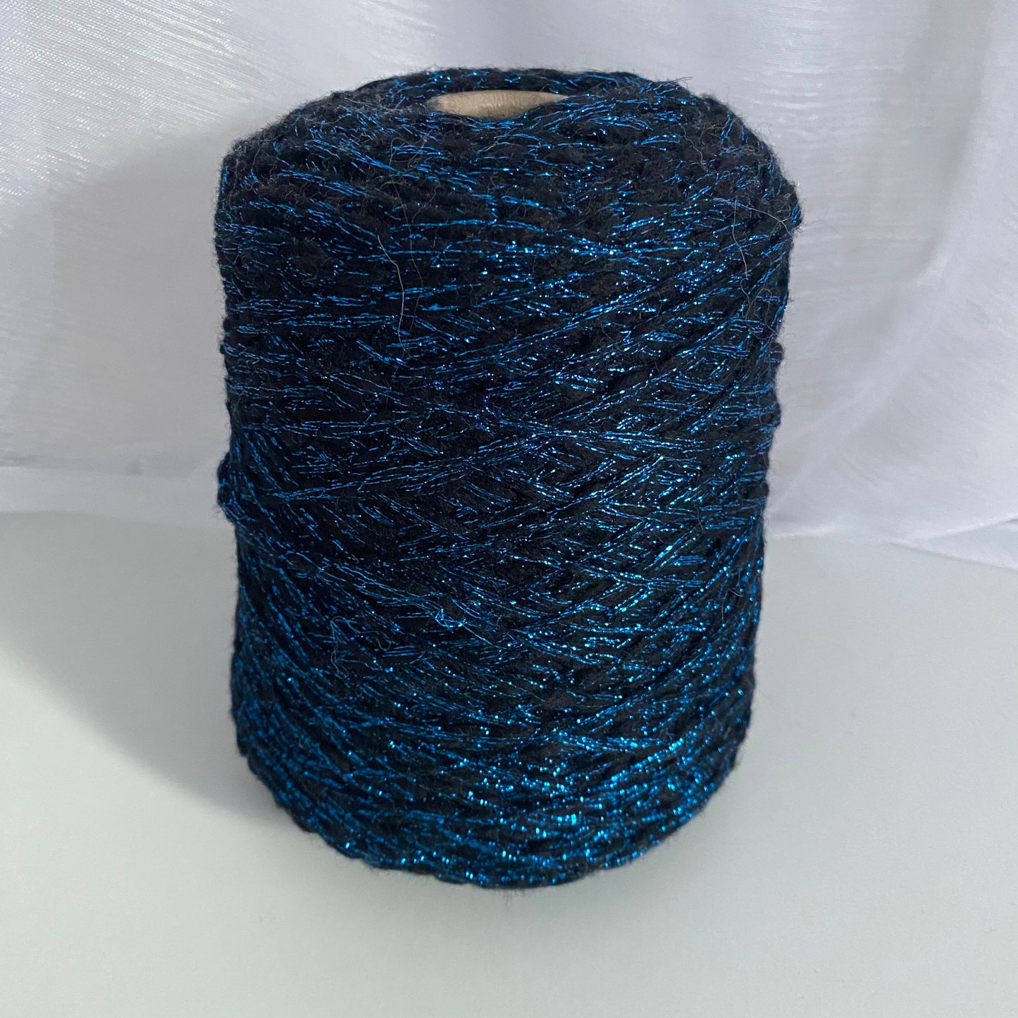 Konenwolle Alpaka mit Lurex 300 g.