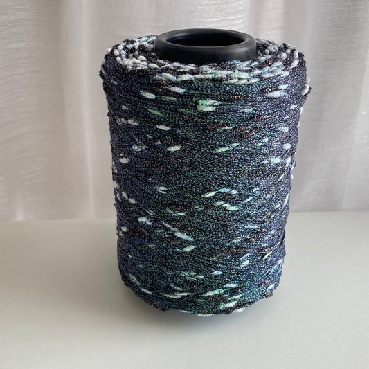 Konenwolle Merinowolle mit  Lurex.